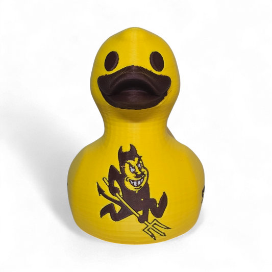 A bright yellow 3D printed PLA duck featuring the black 'SUN DEVILS' text and a cartoon devil graphic on its side, set against a plain white background.