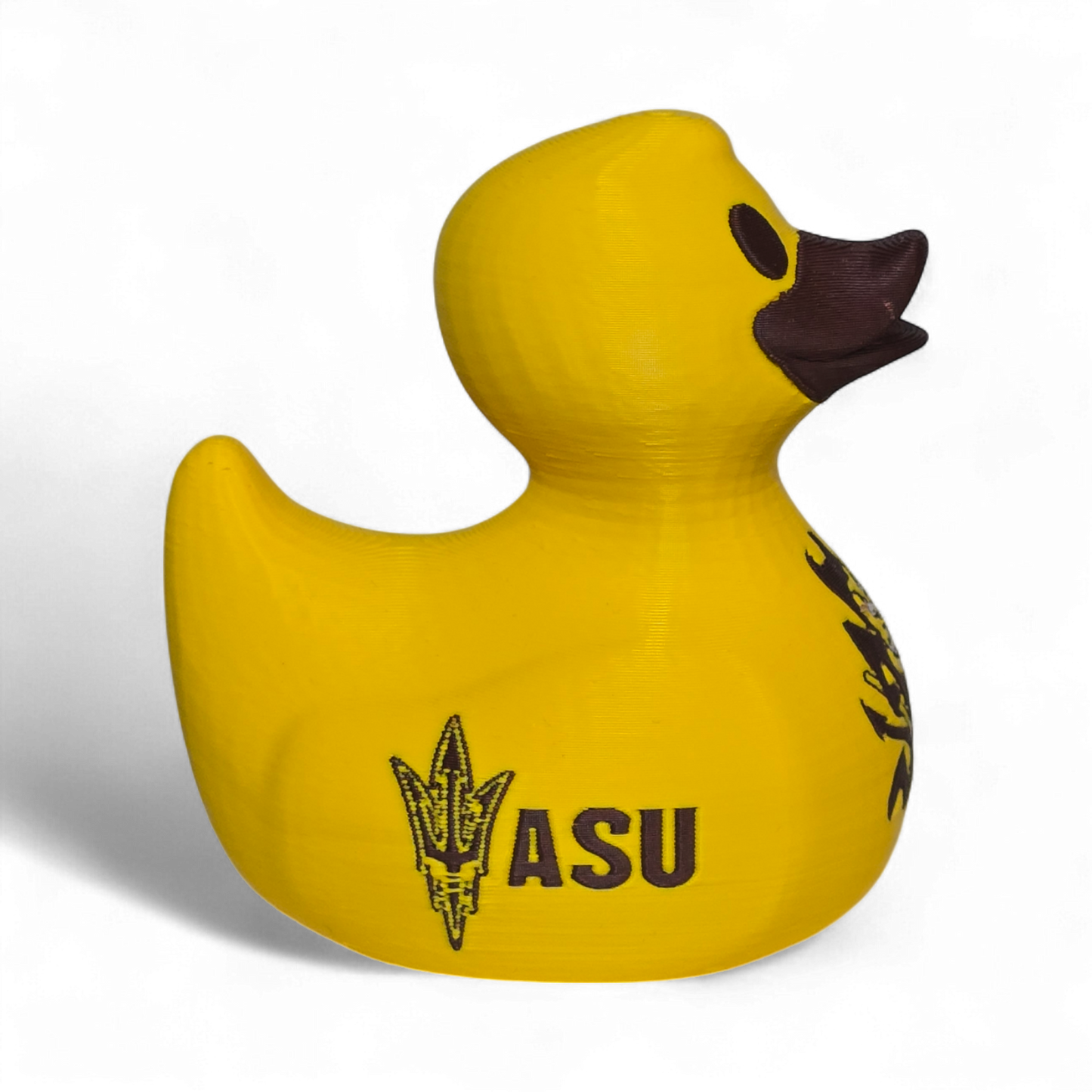 A bright yellow 3D printed PLA duck featuring the black 'SUN DEVILS' text and a cartoon devil graphic on its side, set against a plain white background.