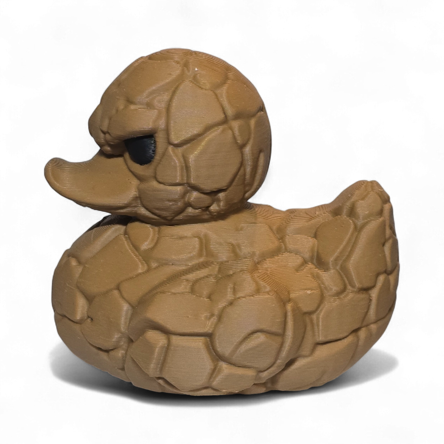 Brown 3D printed PLA duck with a textured surface on a white background