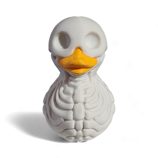 A white 3D printed PLA duck styled as a skeleton, featuring a hollowed-out head, exposed rib details, and a bright yellow beak, shown on a white background with a soft shadow.