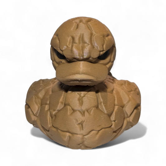 Brown 3D printed PLA duck with a textured surface on a white background