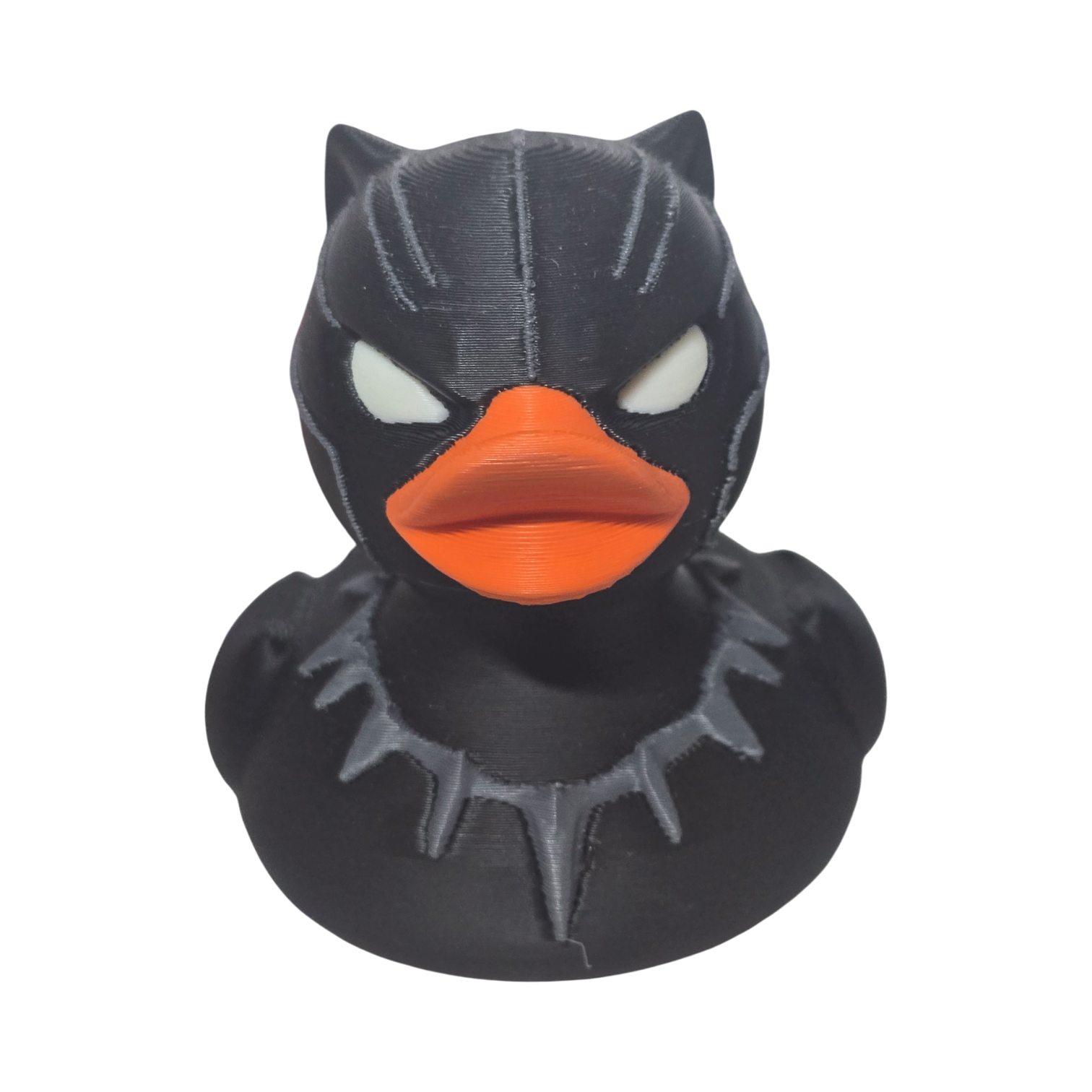 Black 3D printed PLA duck with orange beak on a white background