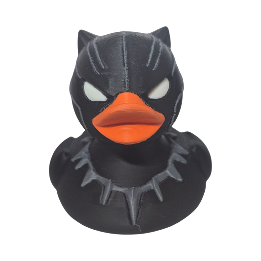 Black 3D printed PLA duck with orange beak on a white background