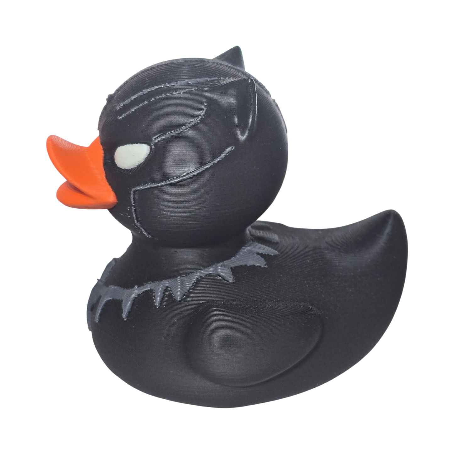 Black 3D Printed PLA duck with an orange beak on a white background