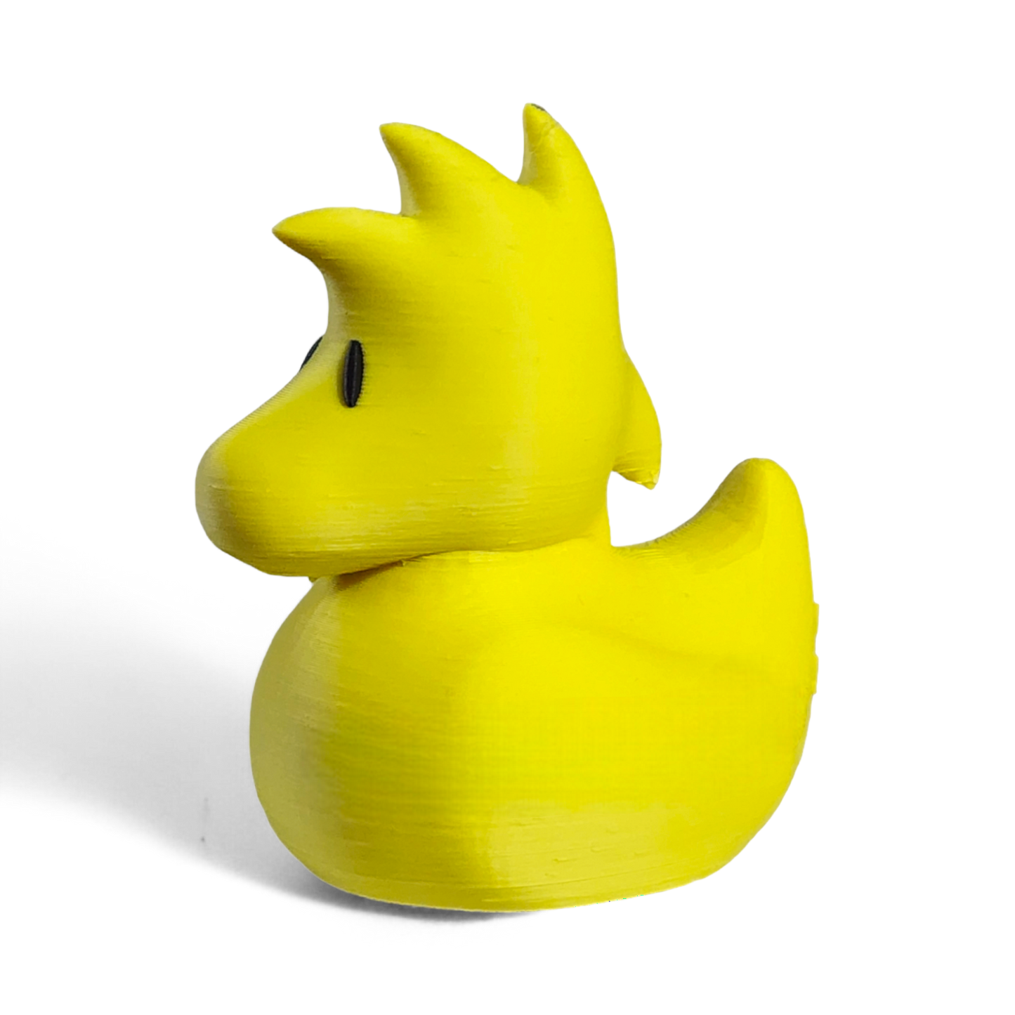 Yellow 3D printed PLA duck with a unique design on a white background