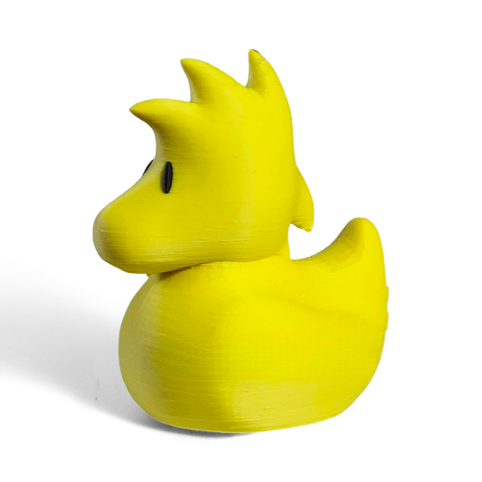 Yellow 3D printed PLA duck with a unique design on a white background