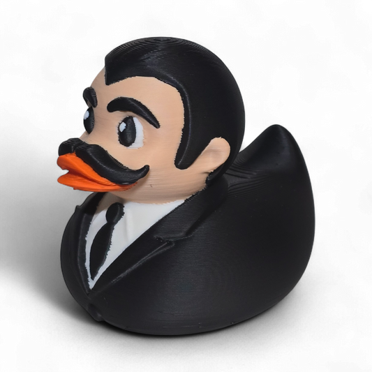 3D printed PLA duck with a formal outfit and mustache on a white background