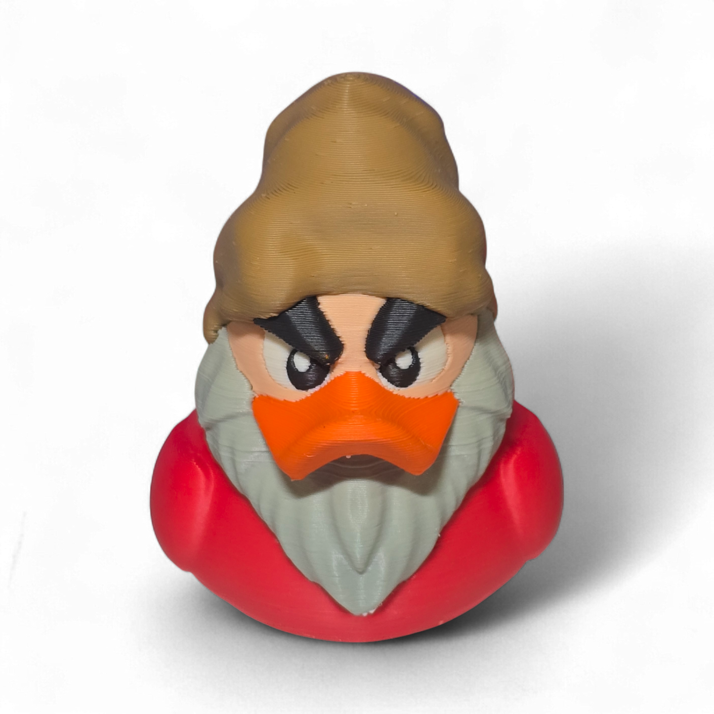 A 3D-printed figurine of a duck character resembling Grumpy, featuring a brown hat, orange beak, gray beard, and a red body, shown on a white background.