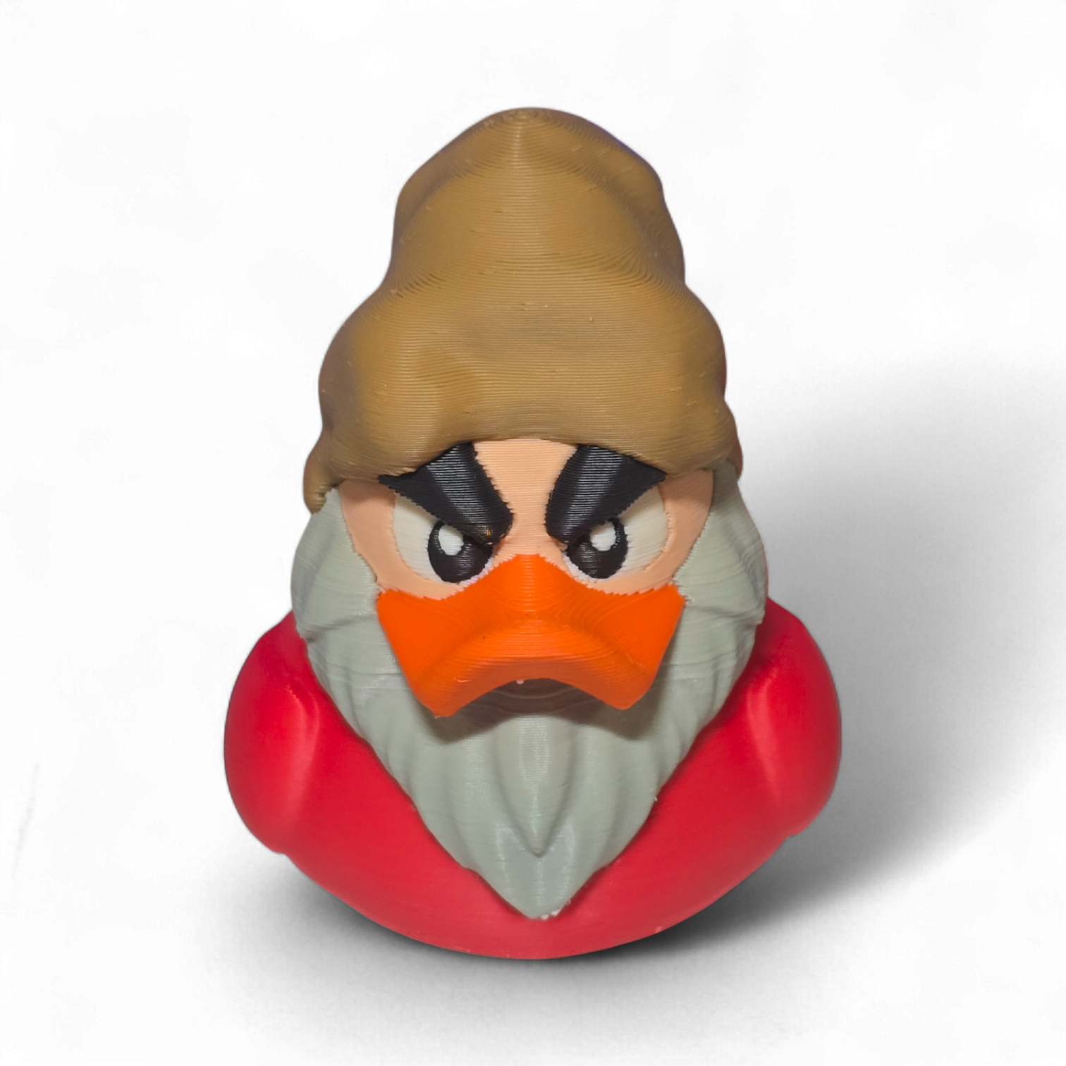 A 3D-printed figurine of a duck character resembling Grumpy, featuring a brown hat, orange beak, gray beard, and a red body, shown on a white background.