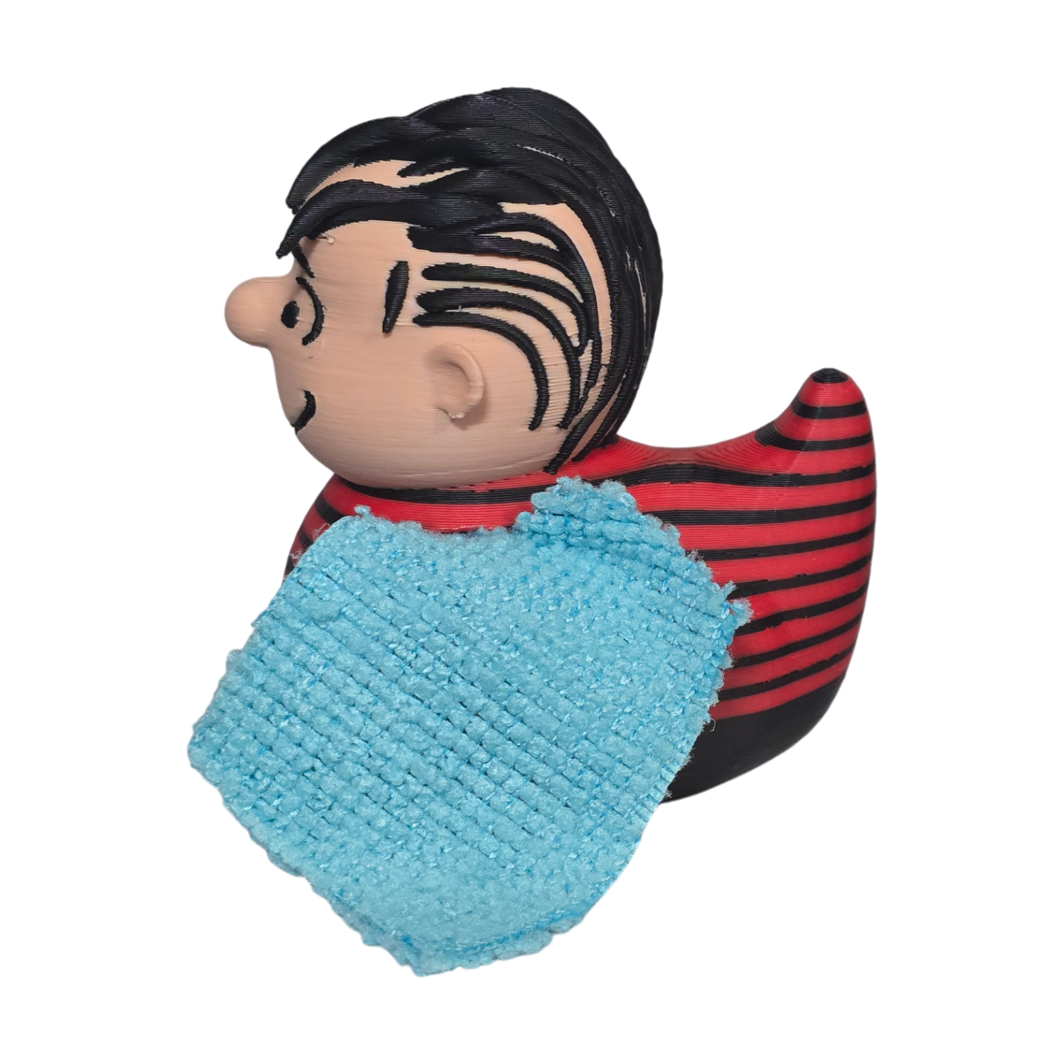 A Peanuts character 3D Printed PLA Duck with black hair, a red and black striped shirt, and a light blue textured blanket, shown on a plain white background.