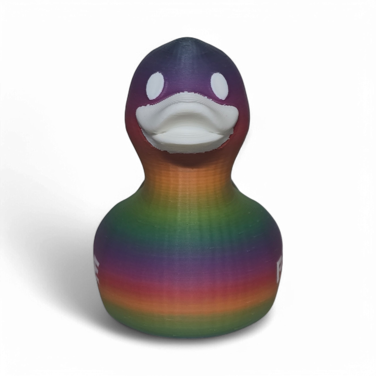 A 3D-printed PLA duck toy featuring a vibrant rainbow gradient pattern with the word 'PRIDE' printed in white on its side, set against a plain white background.