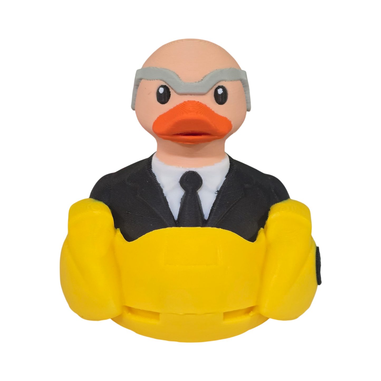 A 3D printed PLA duck toy featuring a bald man in a black suit and tie with a gray mask, sitting inside a bright yellow car-shaped base on a white background.
