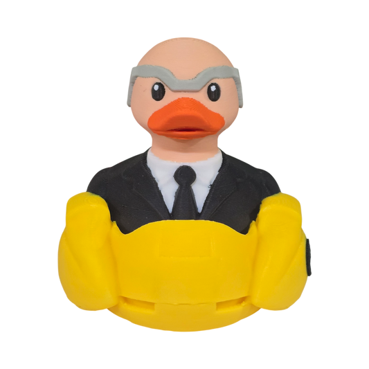 A 3D printed PLA duck toy featuring a bald man in a black suit and tie with a gray mask, sitting inside a bright yellow car-shaped base on a white background.
