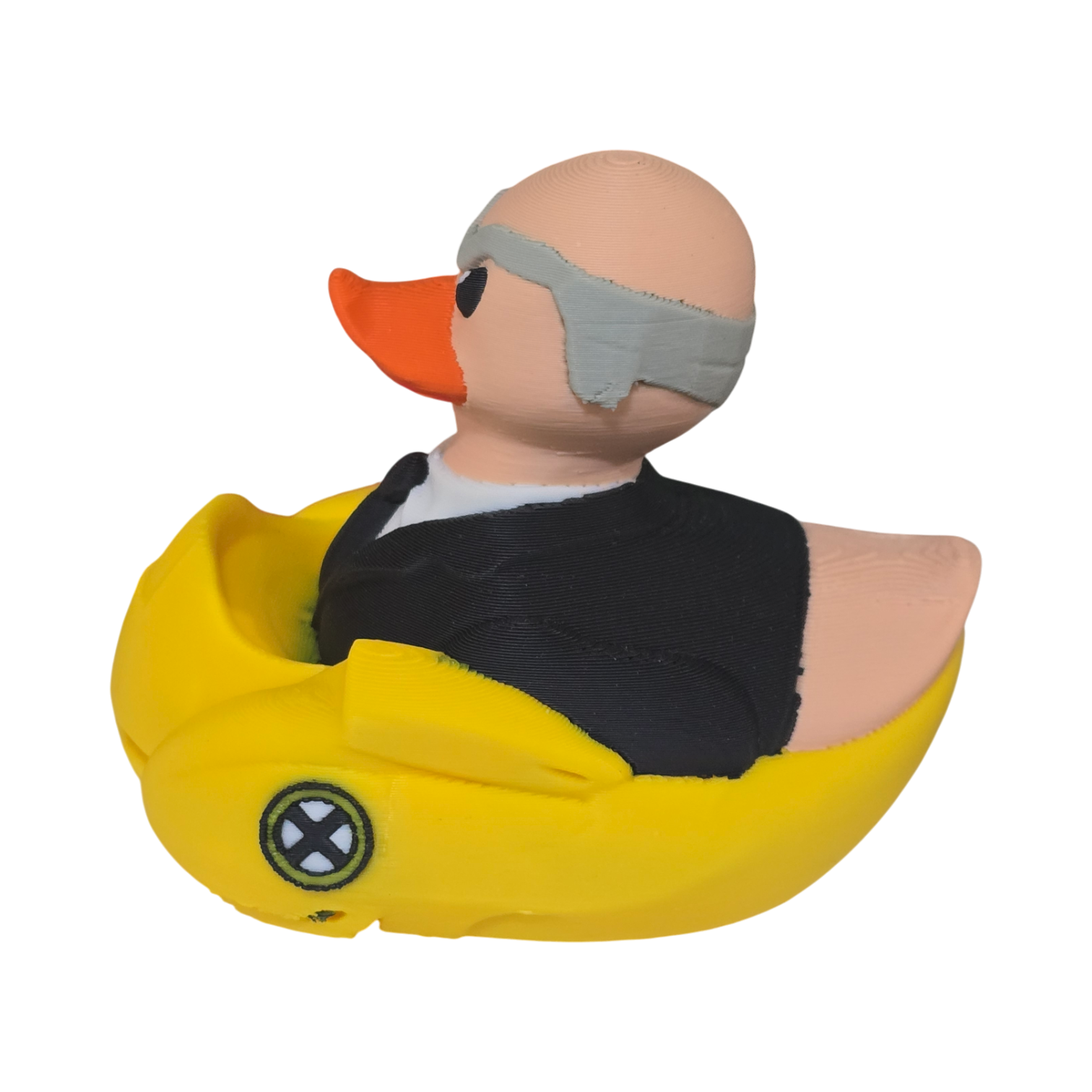 A 3D printed PLA duck toy featuring a bald man in a black suit and tie with a gray mask, sitting inside a bright yellow car-shaped base on a white background.