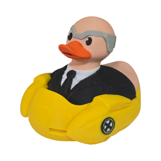 A 3D printed PLA duck toy featuring a bald man in a black suit and tie with a gray mask, sitting inside a bright yellow car-shaped base on a white background.