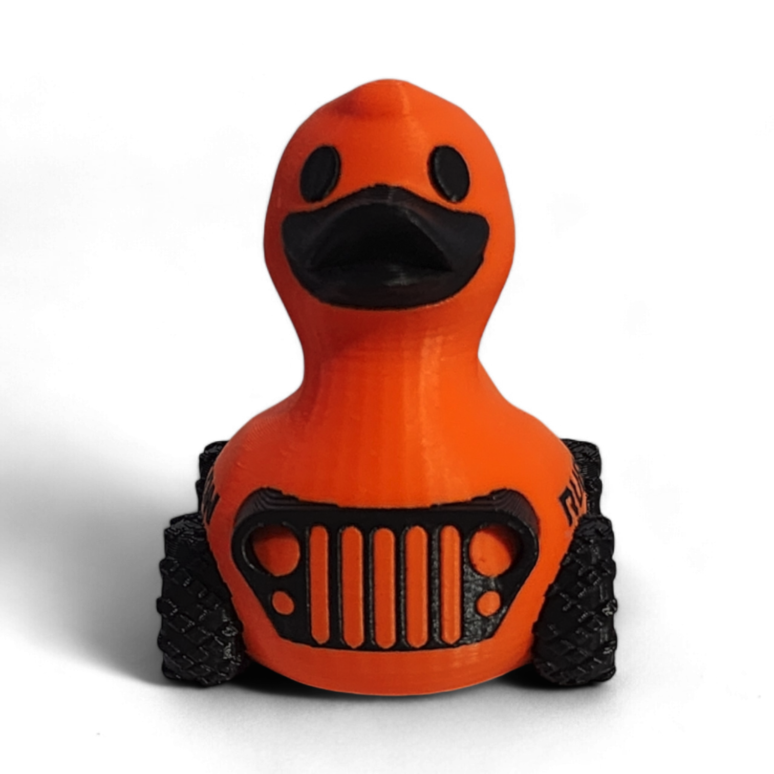 Orange 3D printed duck with a Jeep grille design on a white background