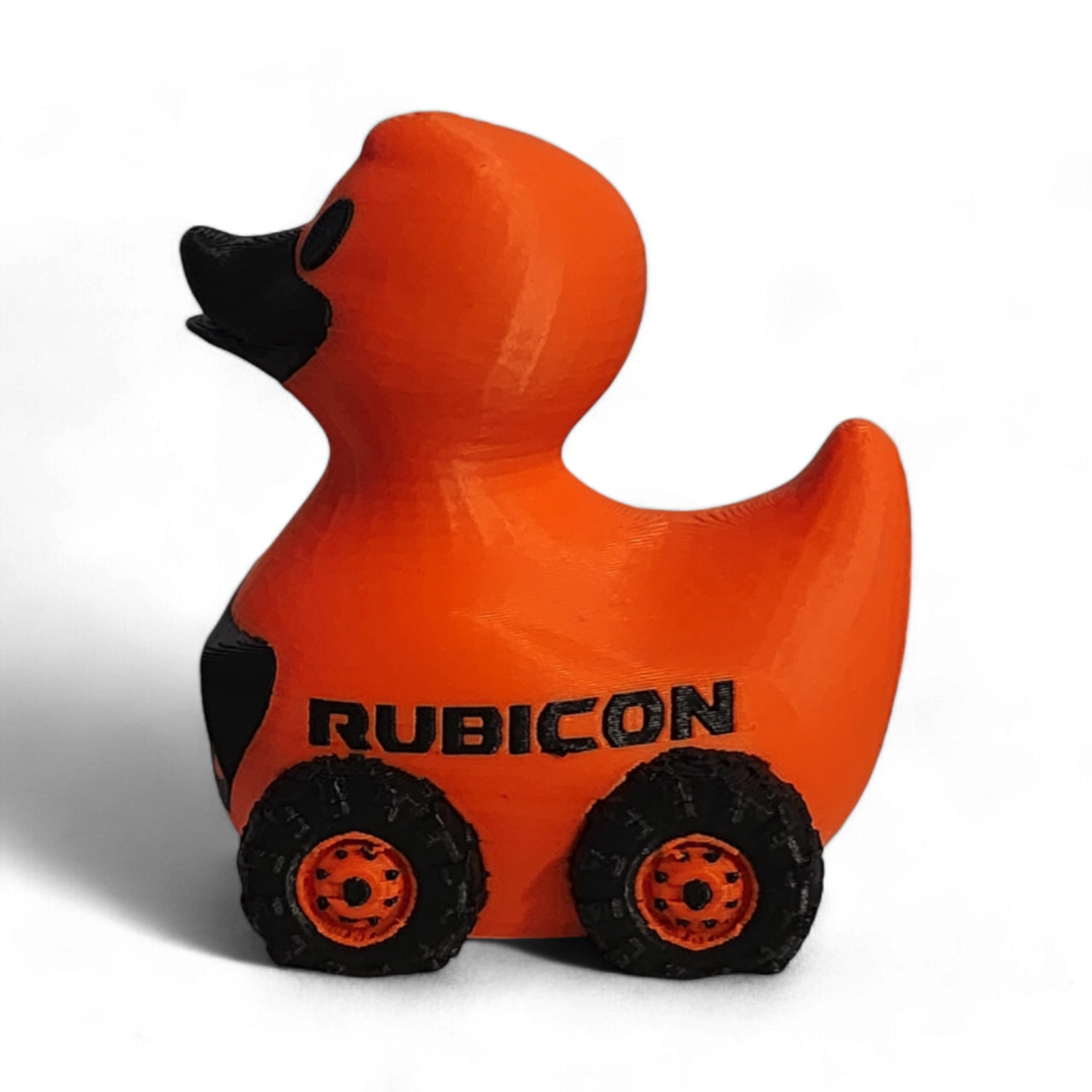Orange 3D printed duck with 'Rubicon' branding on a white background