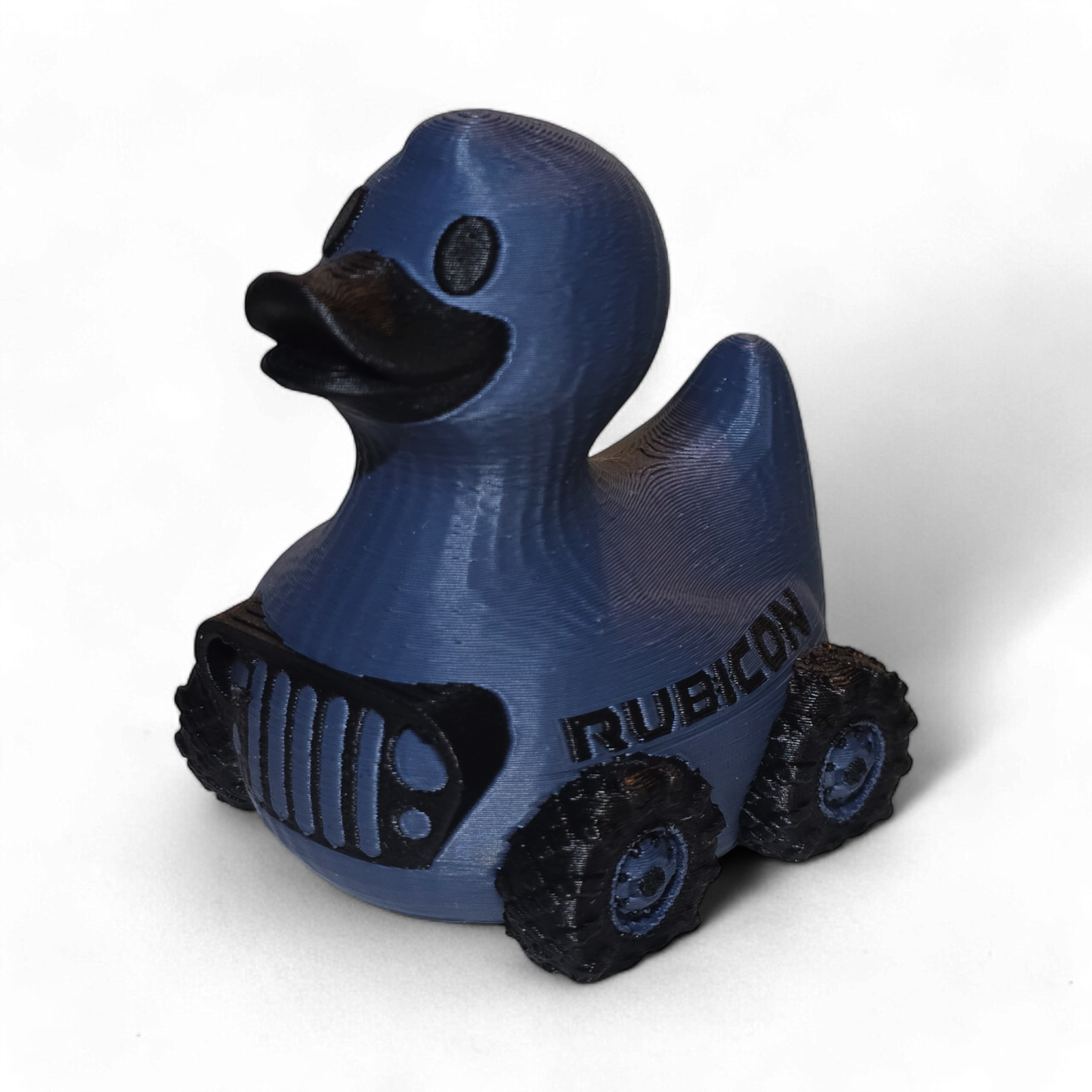 Blue 3D printed duck with Rubicon Jeep design on a white background