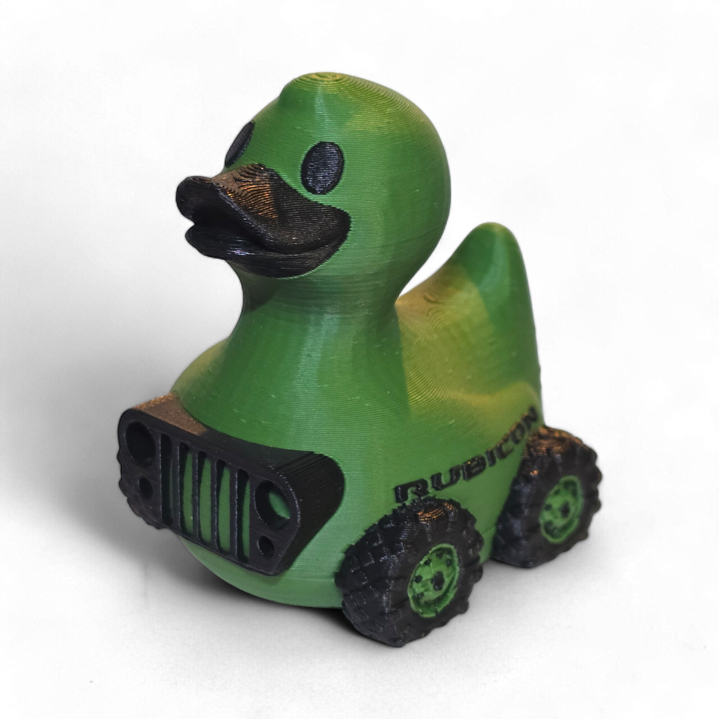Green 3D printed duck with black accents and 'Rubicon' branding on a white background