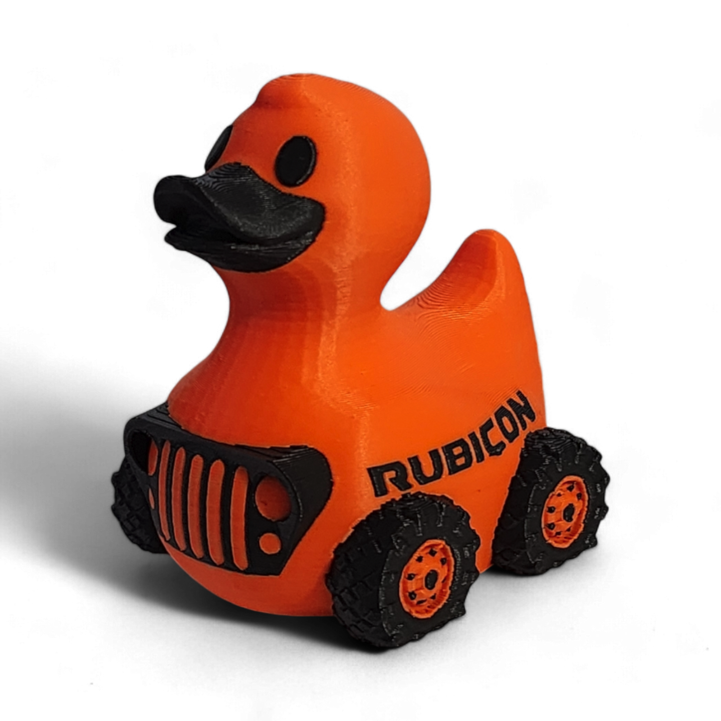 Orange 3D printed duck with black details and 'Rubicon' branding on a white background