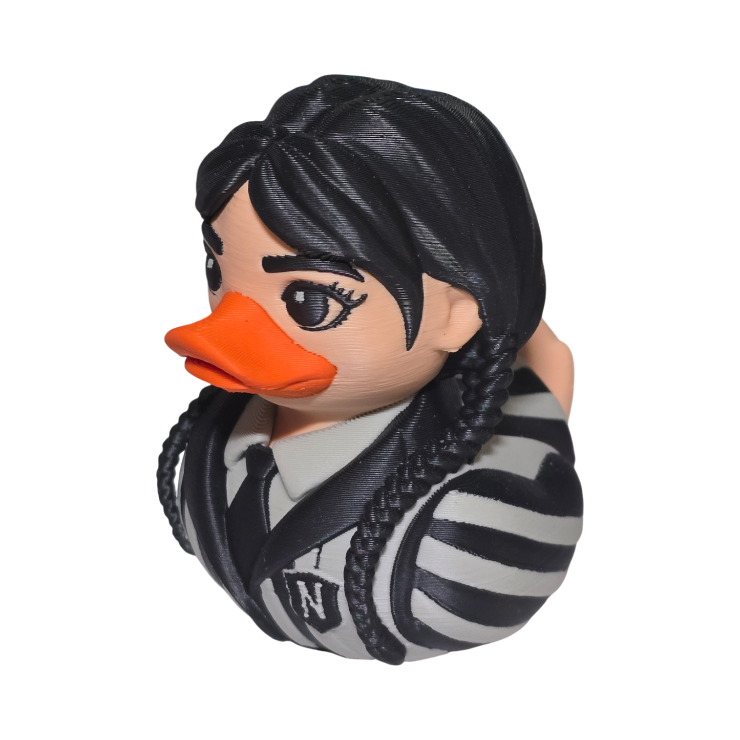 A 3D printed PLA duck styled as a woman with black braided hair, a bright orange beak, and a black-and-white striped shirt, shown on a plain white background.