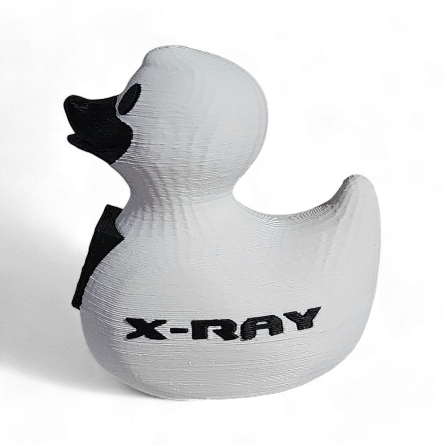 White 3D printed PLA duck with black skeleton design and 'X-Ray' text on a white background